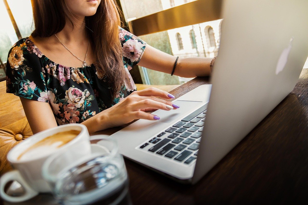 person working laptop ai application